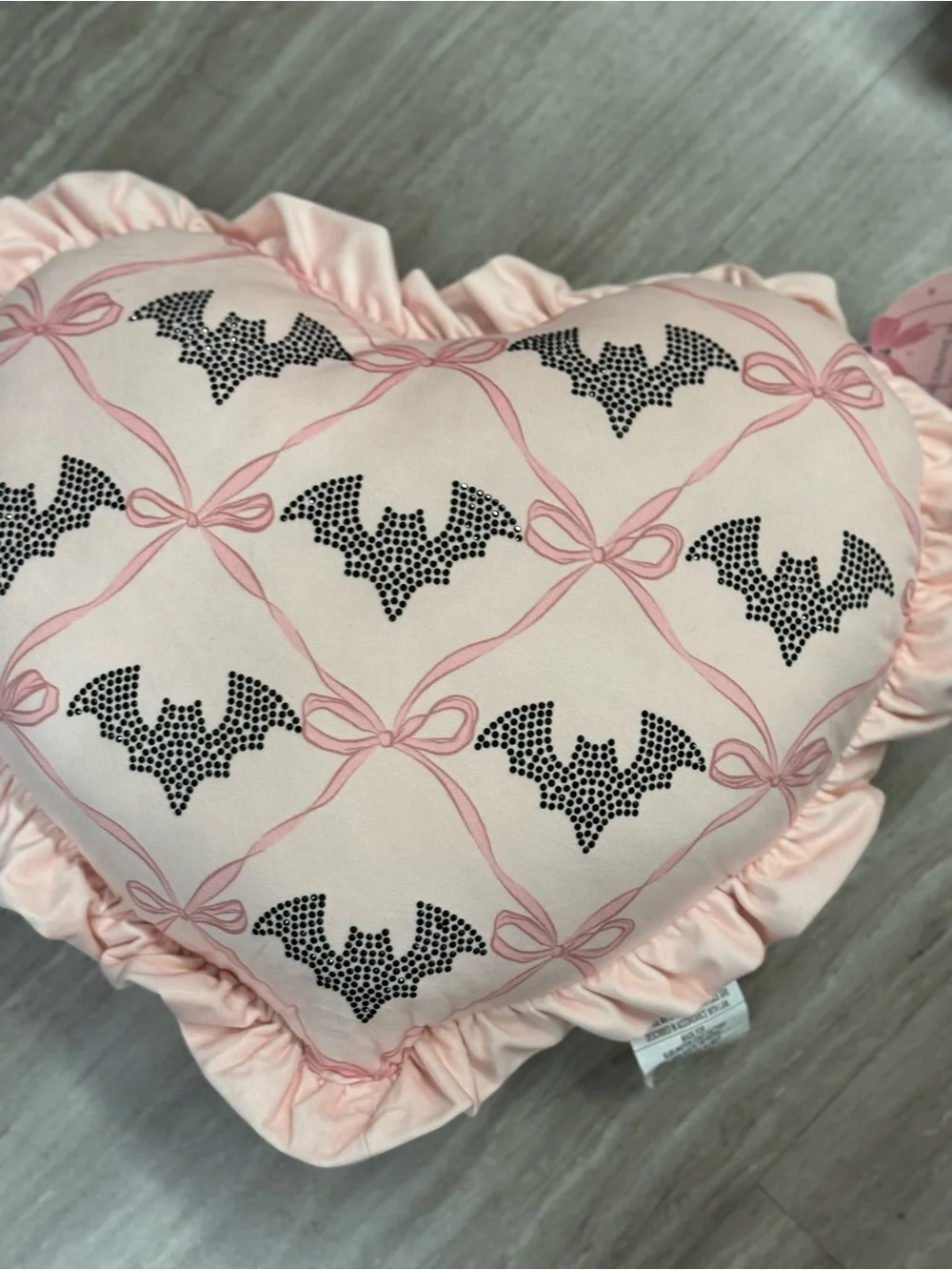 Pink Heart Pillow with Black Bat Pattern